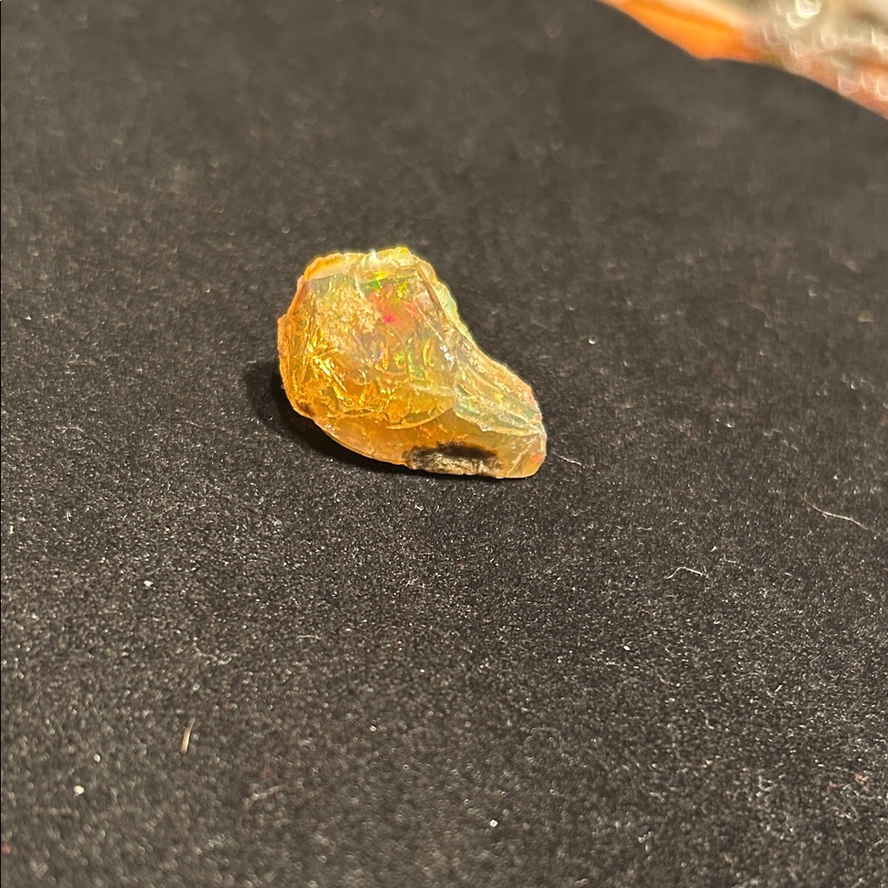 rough Ethiopian Fire Opal (likely from the Welo region).